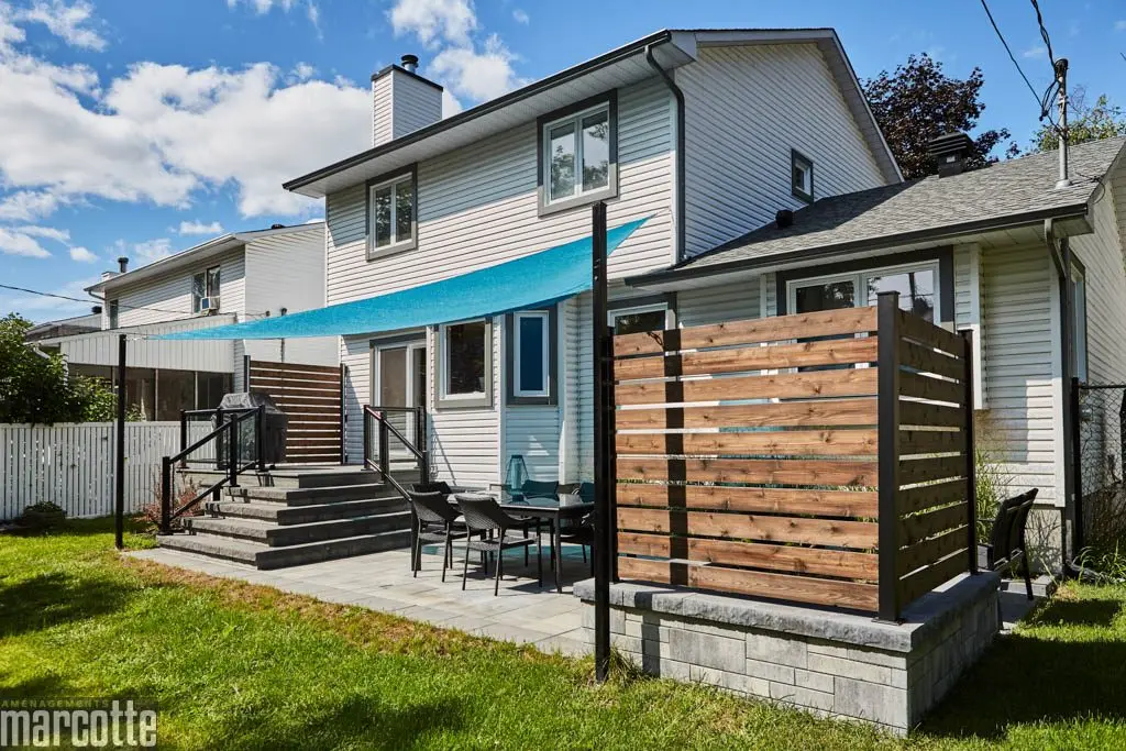Landscaping with Privacy Panels, Slab Patio and Composite Deck