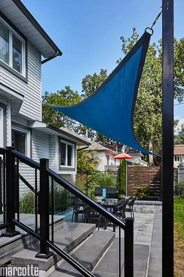 Landscaping with Privacy Panels, Slab Patio and Composite Deck