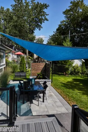 Landscaping with Privacy Panels, Slab Patio and Composite Deck