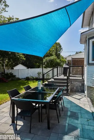 Landscaping with Privacy Panels, Slab Patio and Composite Deck
